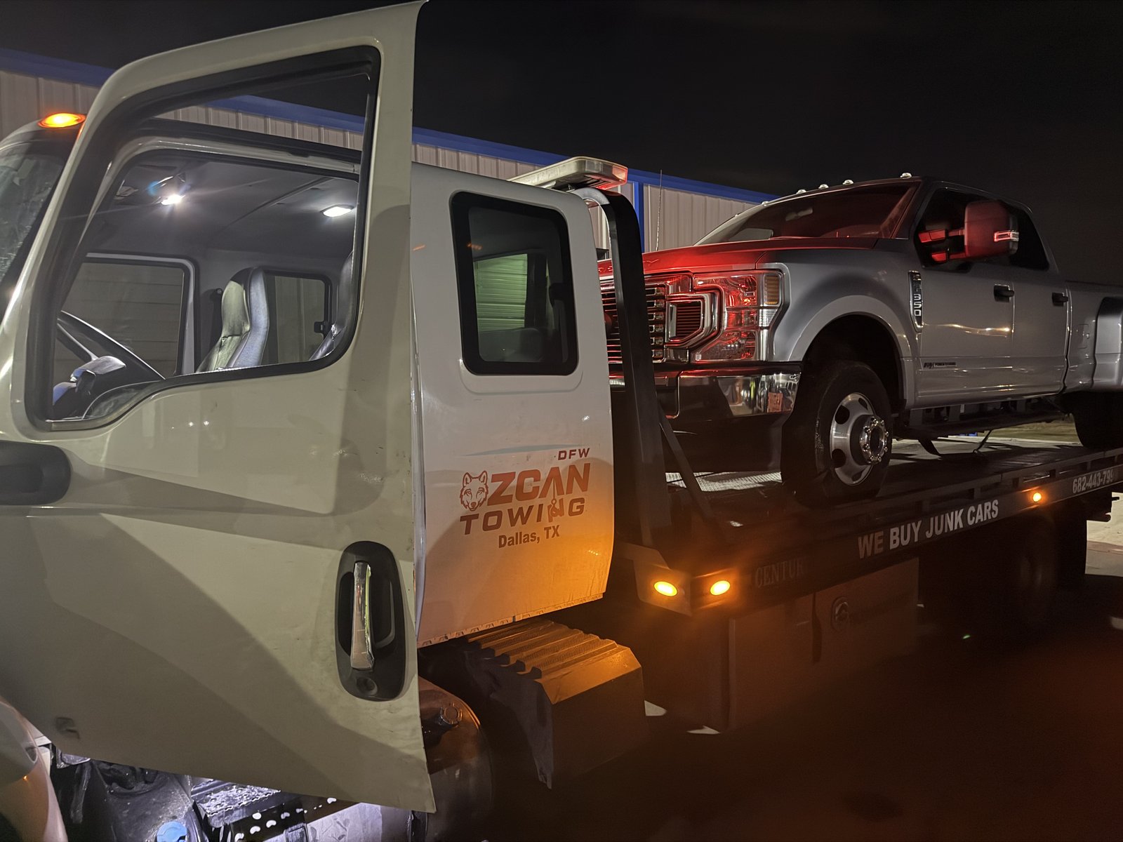 Ozcan Towing truck on a call in East Dallas near Garland