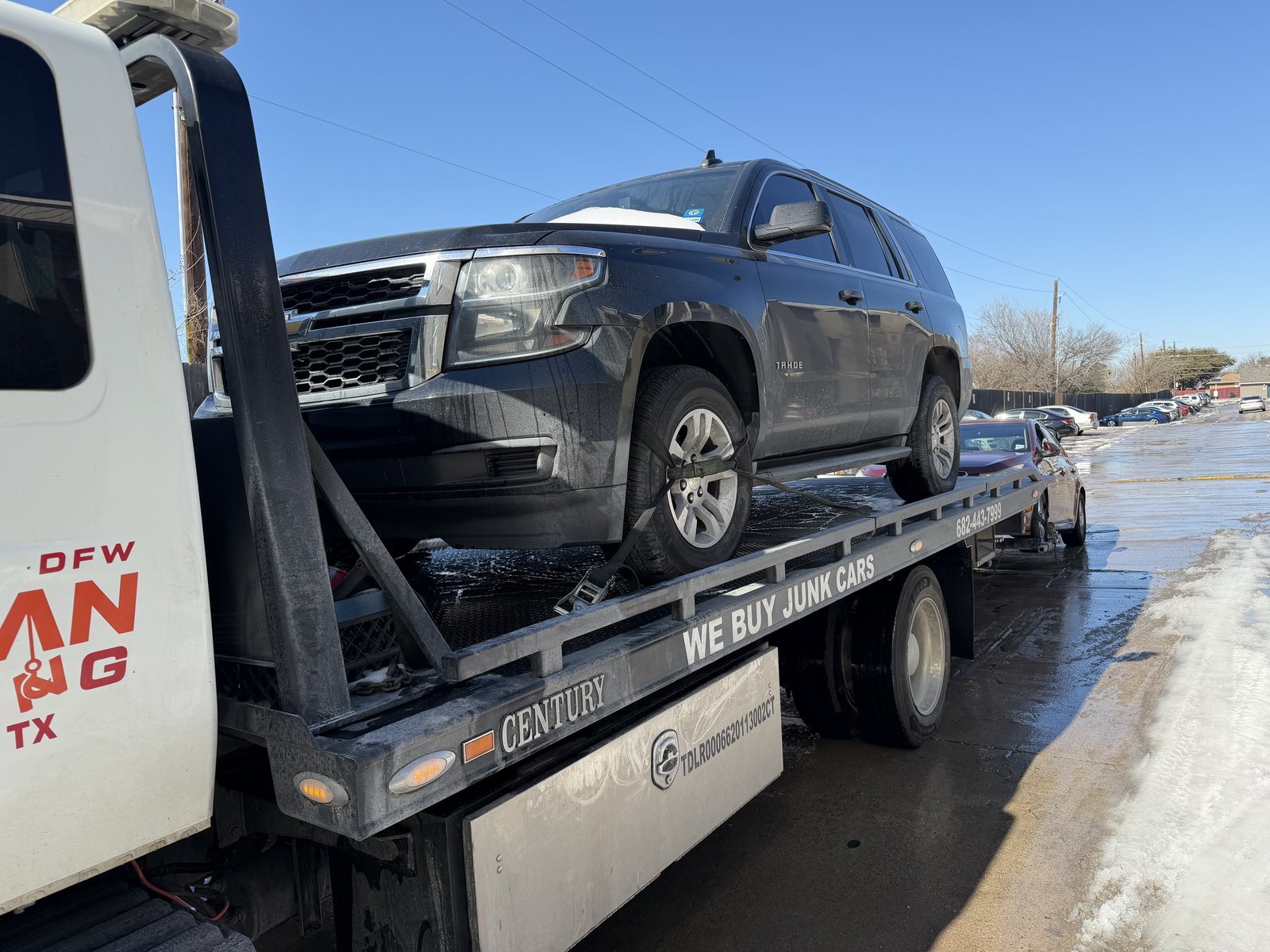 Flatbed tow truck on a call in Deep Ellum, Dallas TX